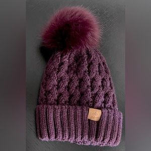 Cable knit fleece lined pom hat